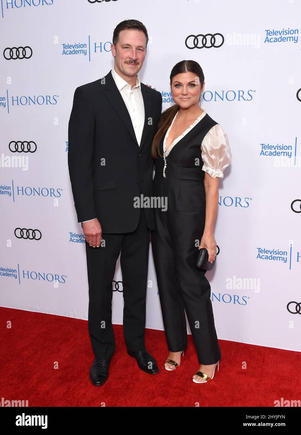 Tiffani Thiessen and Brady Smith attending the Television Academy