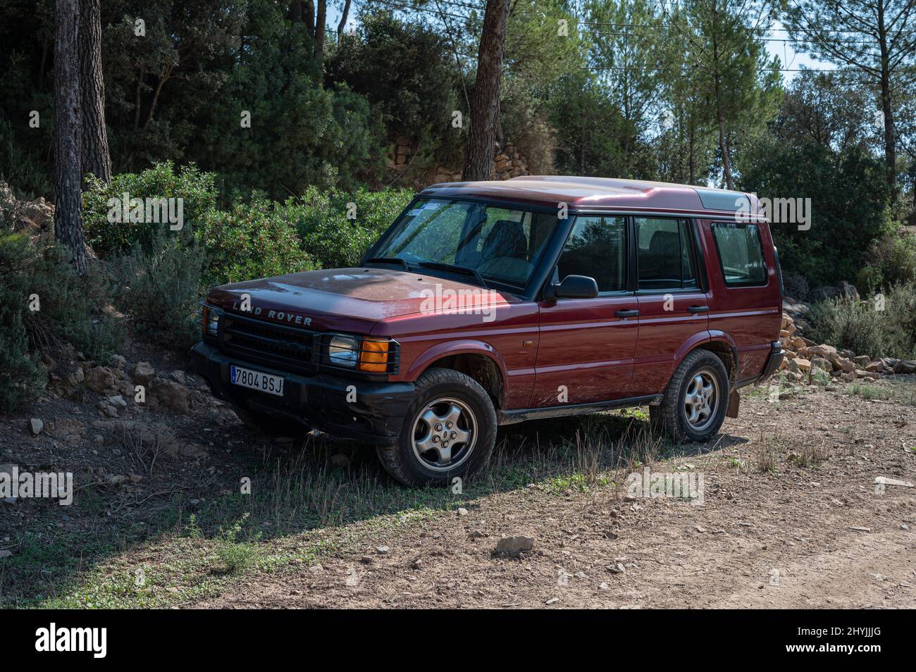 Of a first generation Land Rover Discovery dirty with mud Stock Photo