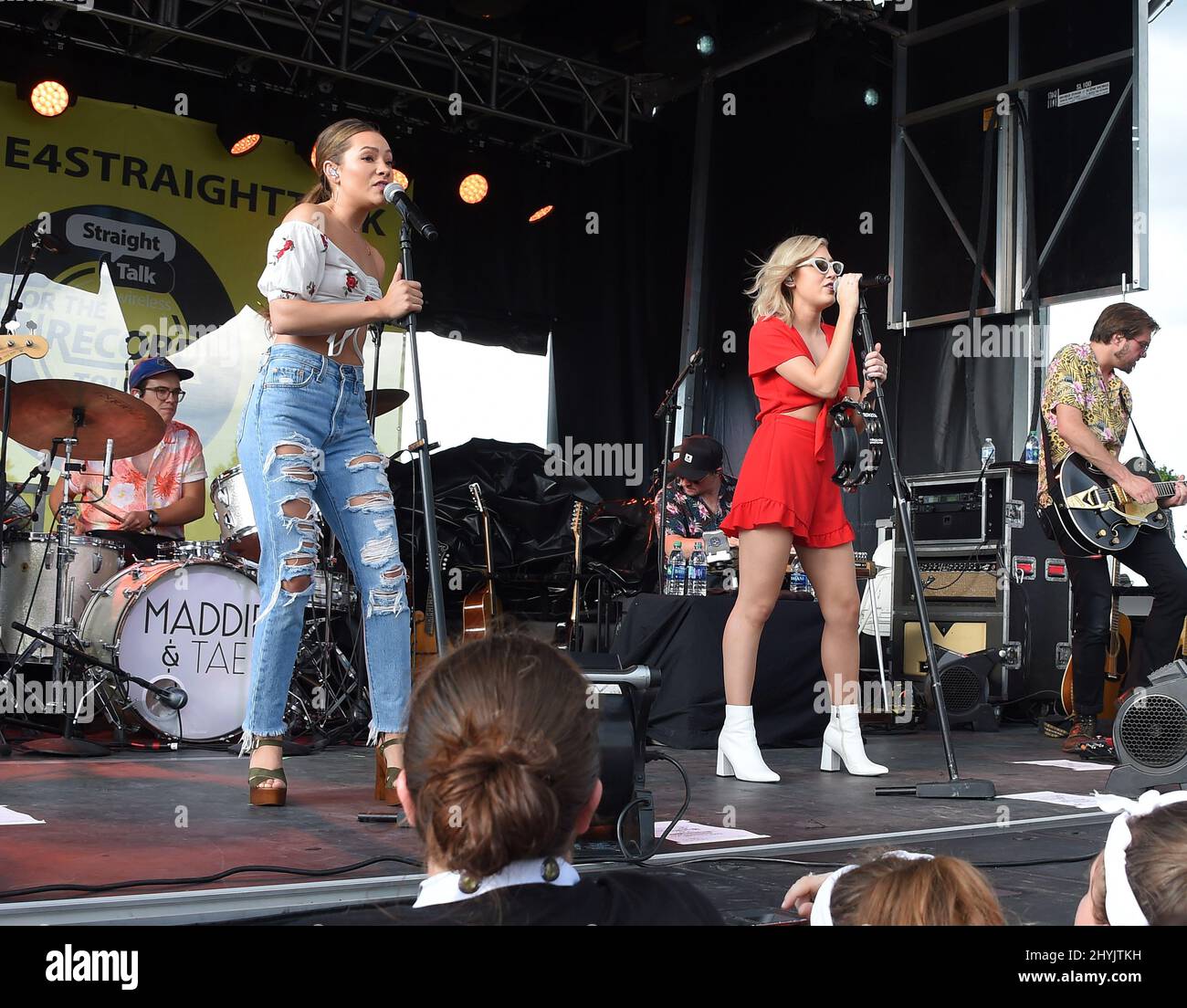 Taylor Dye and Maddie Marlow of Maddie & Tae onstage at the Straight Talk 'For The Record' Country Music Tour held at the Walmart Supercenter on June 27, 2019 in Mount Juliet, TN. Stock Photo