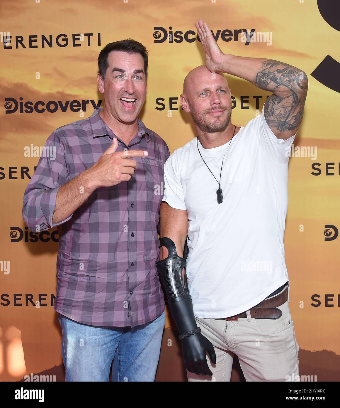 Rob Riggle and Paul de Gelder arriving to the Discovery Channel's 'Serengeti' Special Screening at Wallis Annenberg Center for the Performing Arts on July 23, 2019 in Beverly Hills, CA. Stock Photo