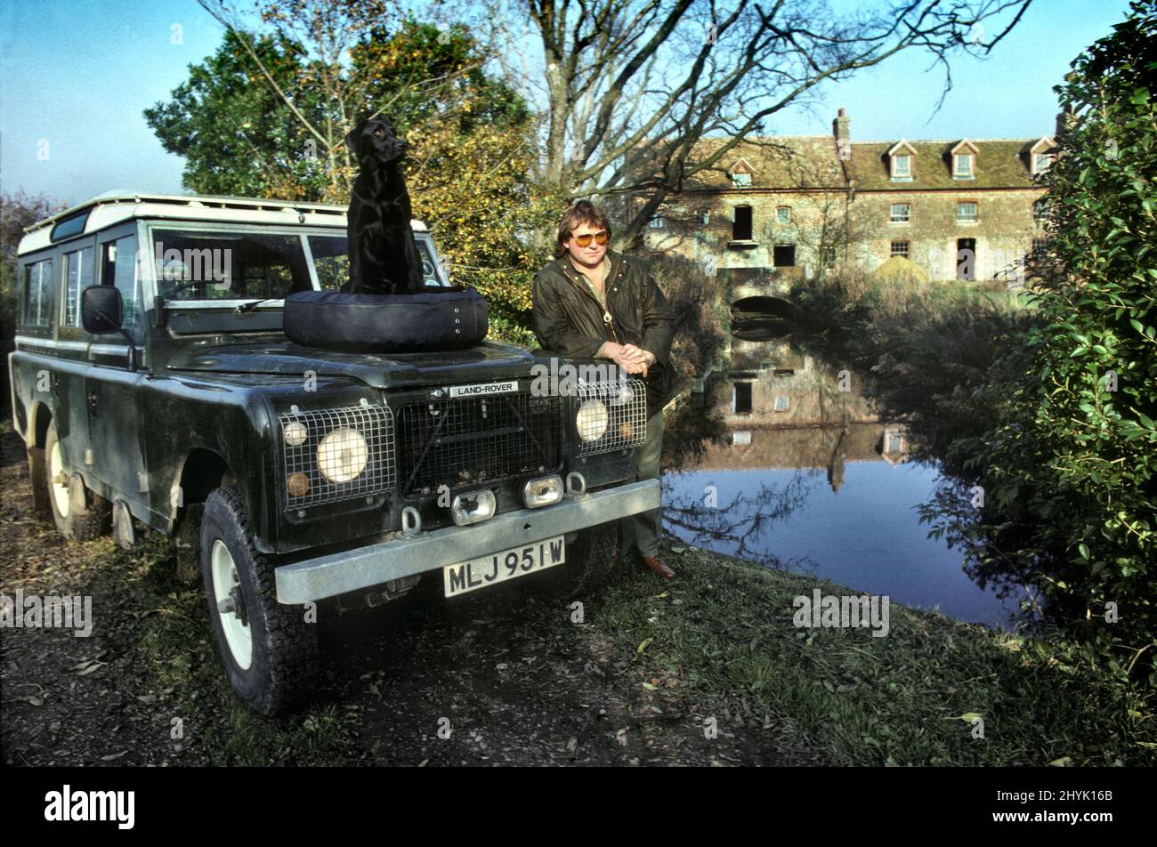 Greg Lake with his wife and dog at his home in Hampshire 1981 Stock Photo