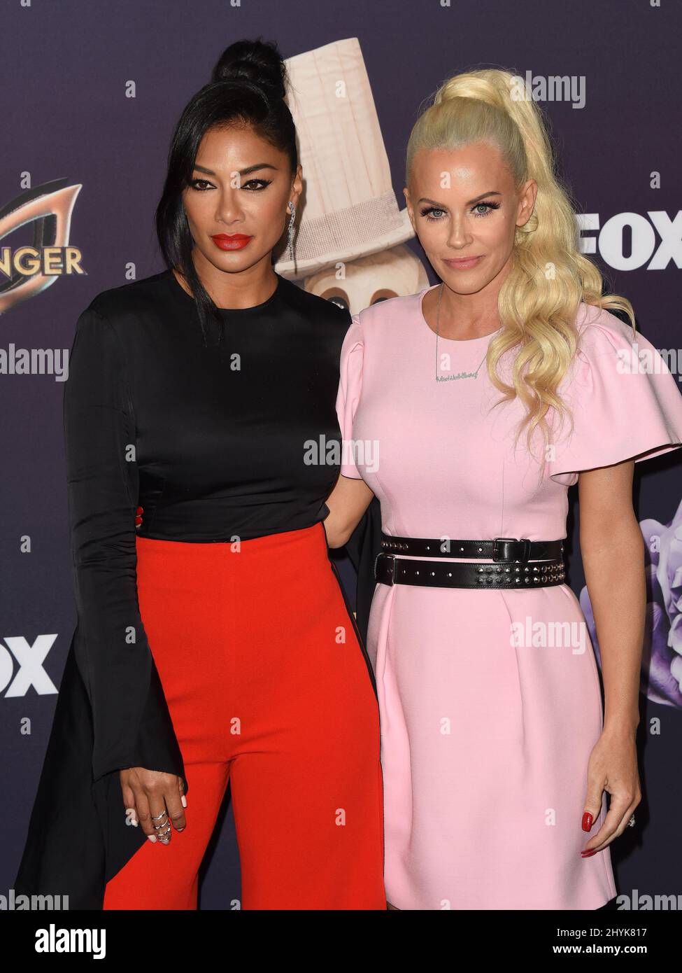 nicole scherzinger pink dress masked singer Nicole Scherzinger and Jenny McCarthy arriving to the 'The Masked Singer'  Season 2 Premiere at The Bazaar at SLS Beverly Hills Stock Photo