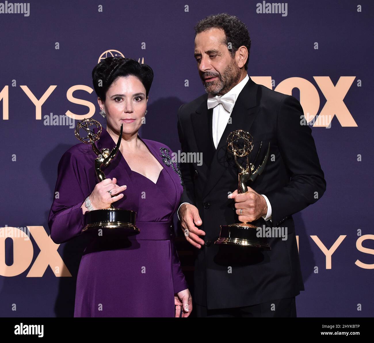 Alex Borstein and Tony Shalhoub in the press room during the 71st ...