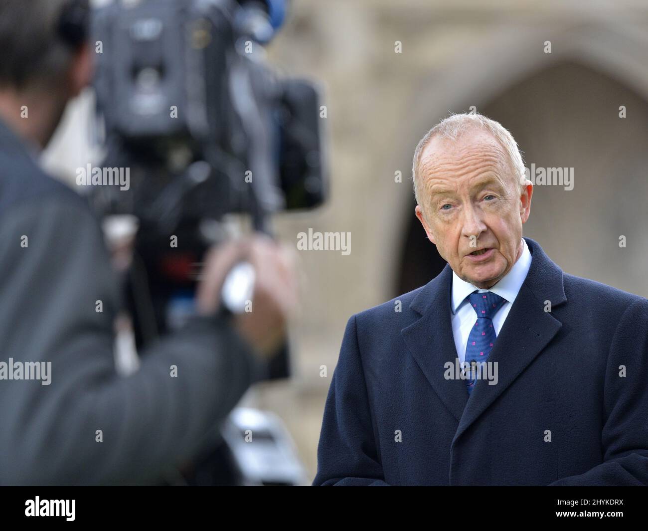 Nicholas Witchell - BBC Royal Correspondent- reporting outside the Commonwealth Service at Westminster Abbey, London, 14th March 2022. Stock Photo