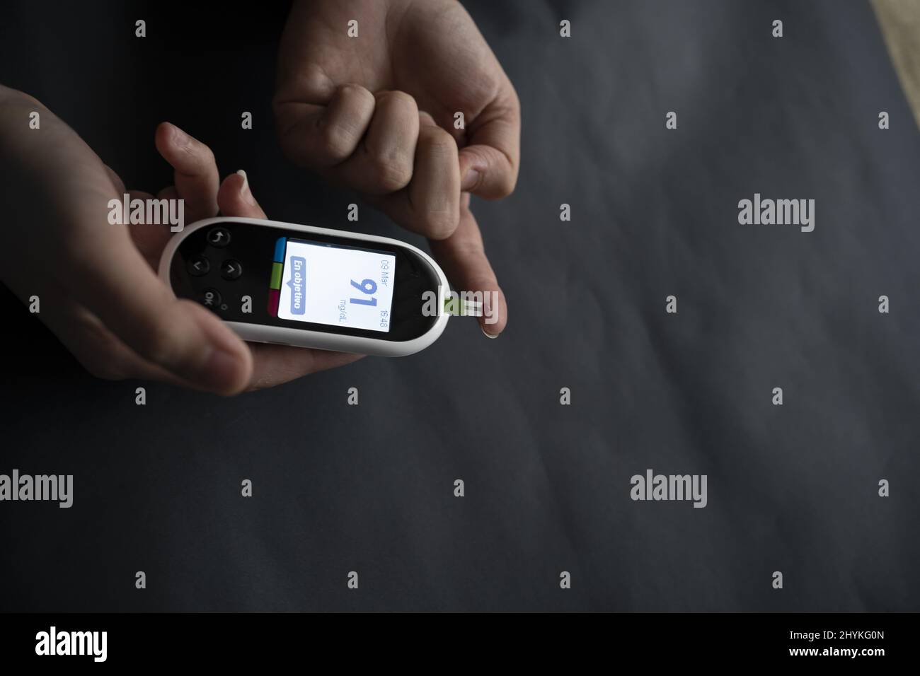 Person using glucometer test hi-res stock photography and images - Alamy