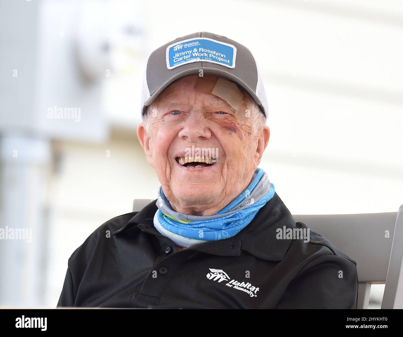 Jimmy Carter volunteers at Habitat for Humanity to help build houses in