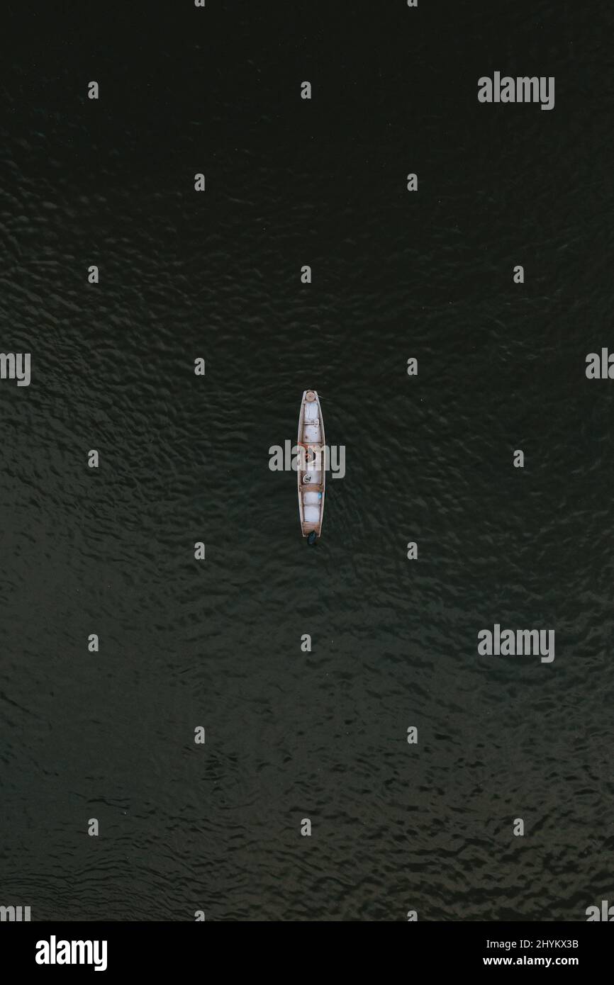 Vertical bird's eye view of the boat on the water surface. Australia ...