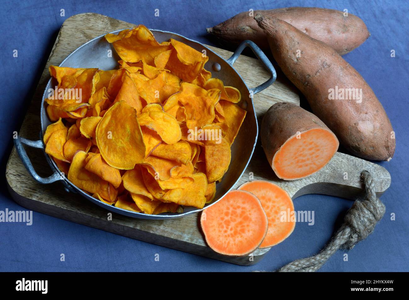 Sliced sweet potato (Ipomoea batatas) and sweet crisps in skin Stock Photo