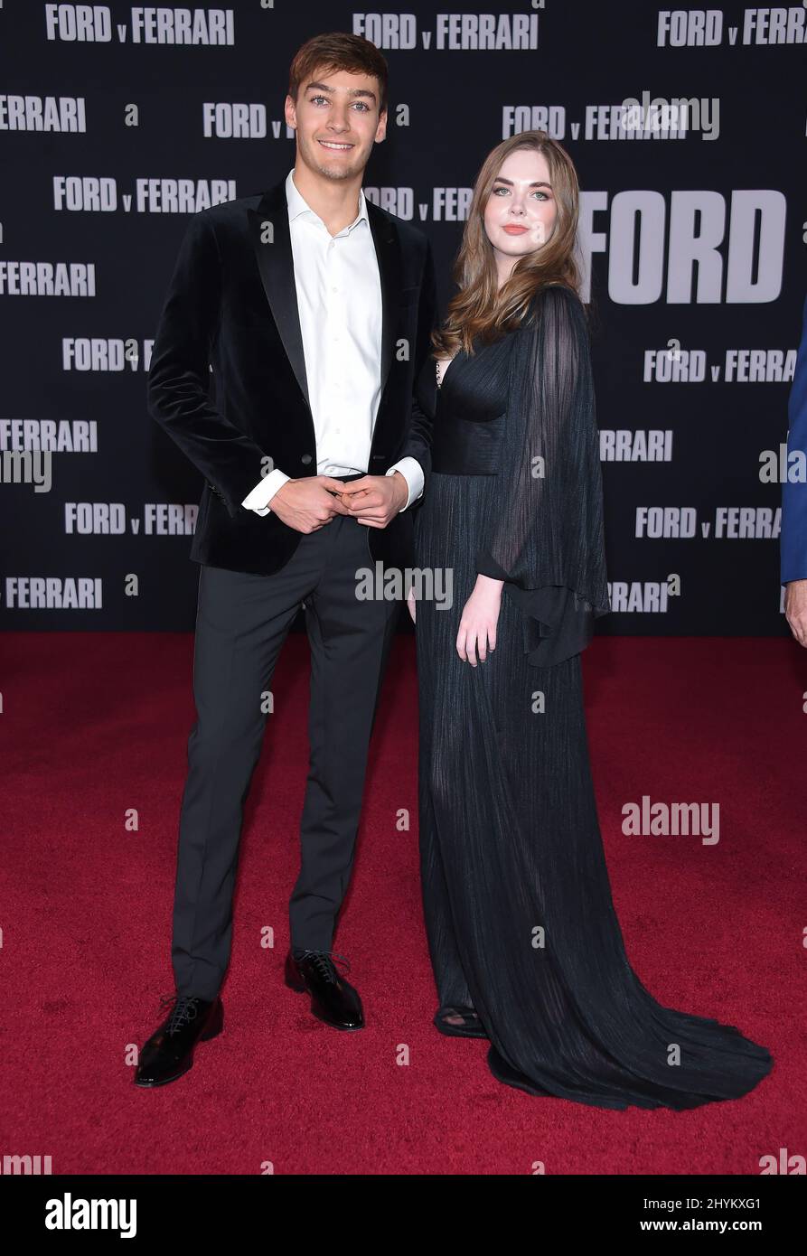 George Russell and Maisy Kay arriving to the Ford v Ferrari' Los Angeles Screening at TCL Chinese Theatre on November 04, 2019 in Hollywood, CA. Stock Photo