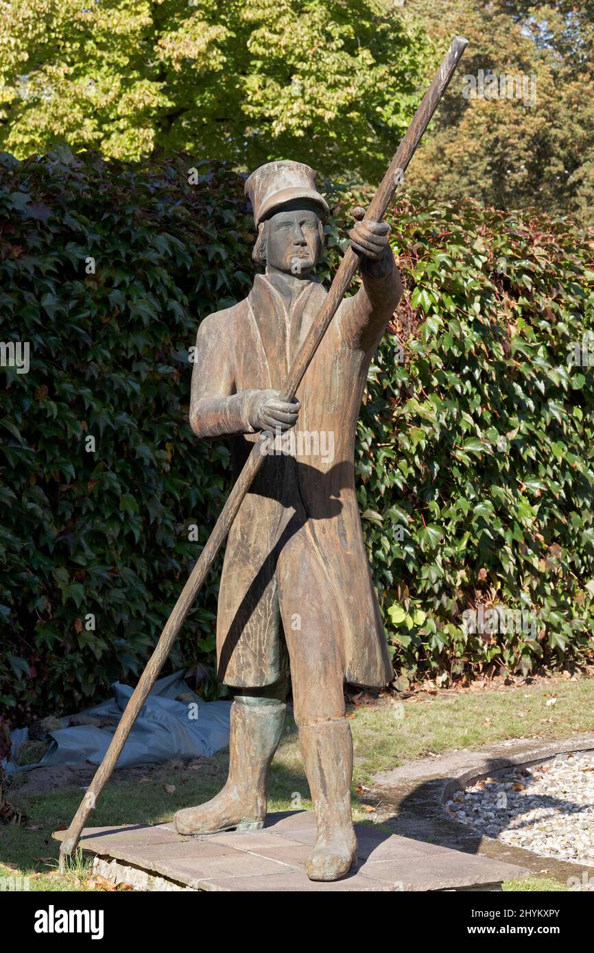 Ferryman, statue by Hermann Scholl on the former Tengelmann site, commemorating the Scholl ferry across the river Ruhr in the 18th century Muelheim Stock Photo