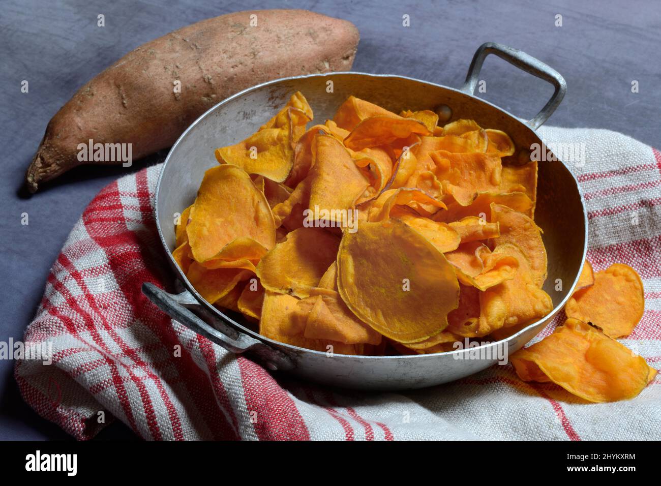 Sweet potato (Ipomoea batatas) and sweet crisps in skin Stock Photo