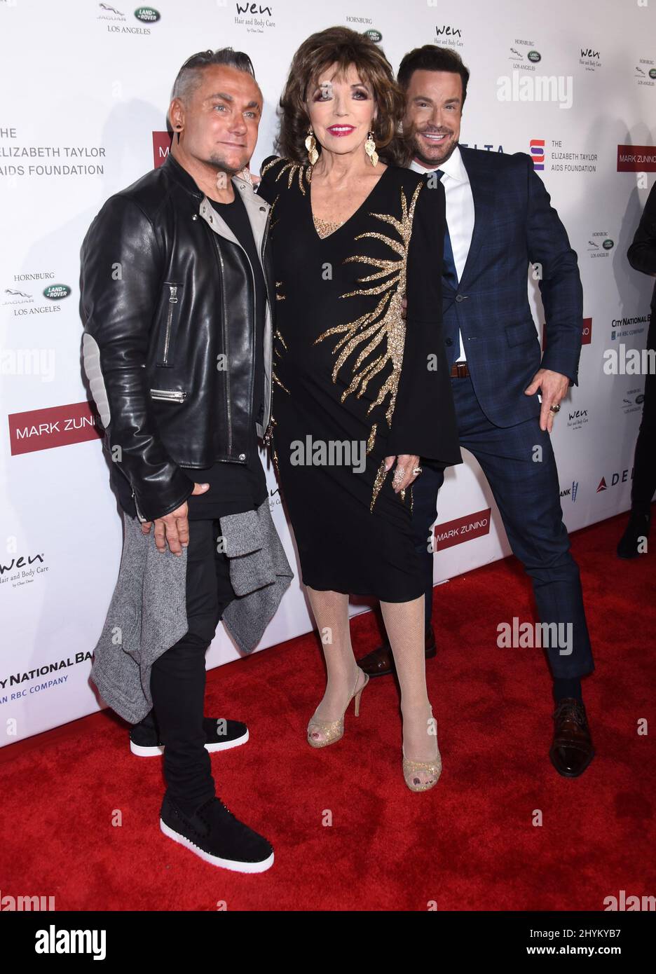 Mark Zunino, Joan Collins and Rene Horsch attending the Elizabeth Taylor AIDS Foundation Reception held at the Mark Zunino Atelier in Beverly Hills, California Stock Photo