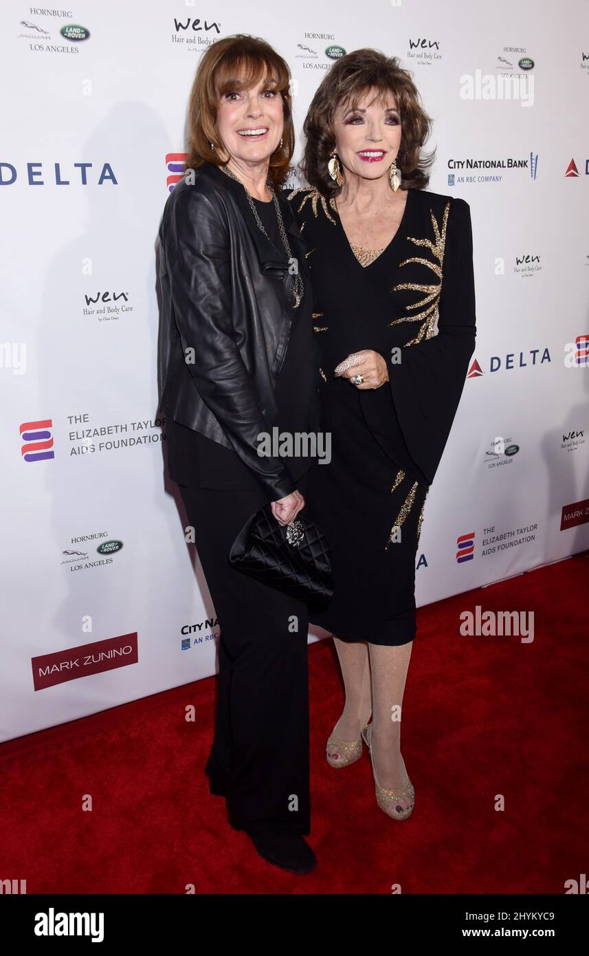 Linda Gray and Joan Collins attending the Elizabeth Taylor AIDS Foundation Reception held at the Mark Zunino Atelier in Beverly Hills, California Stock Photo