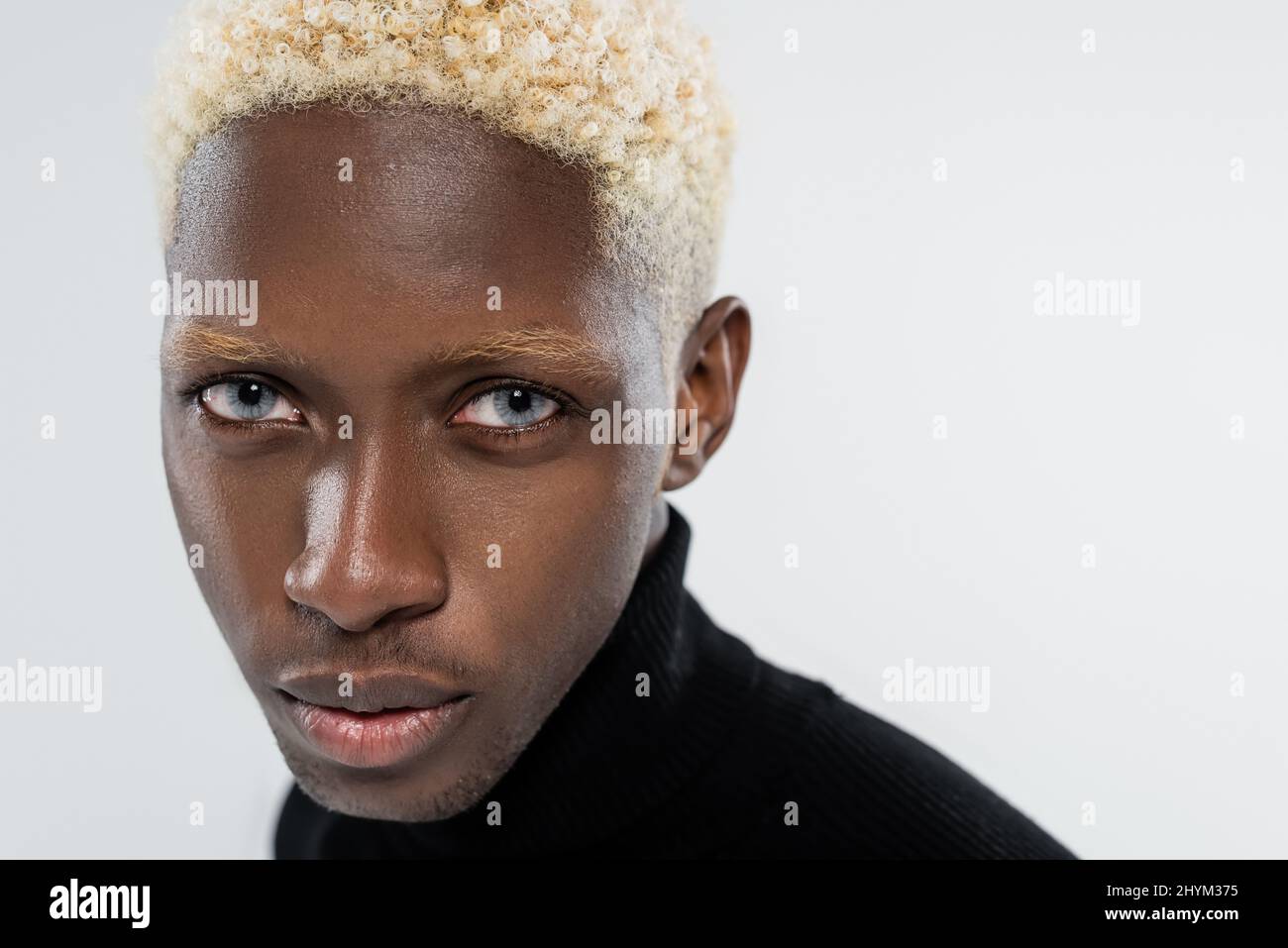 African man blue eyes hi-res stock photography and images - Alamy