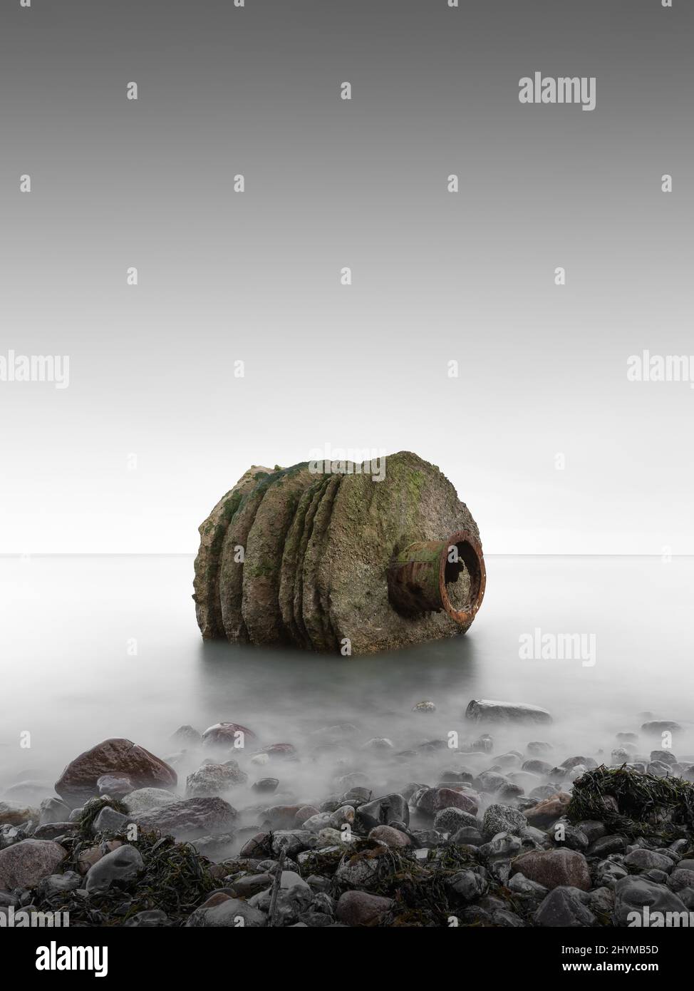 Old foundation at the tide gauge house on the beach near Kap Arkona on the German island of