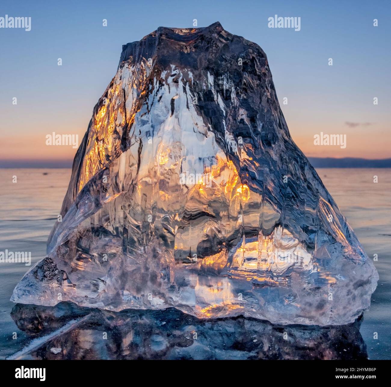 Sunlight refracted in piece of ice Stock Photo