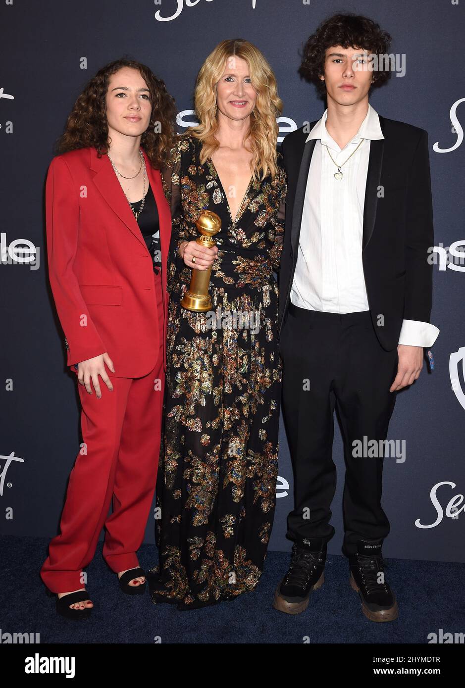 Laura Dern, Ellery Harper and, Jaya Harper at the Instyle and Warner Bros Golden Globes After Party held at the Beverly Hilton Hotel Stock Photo