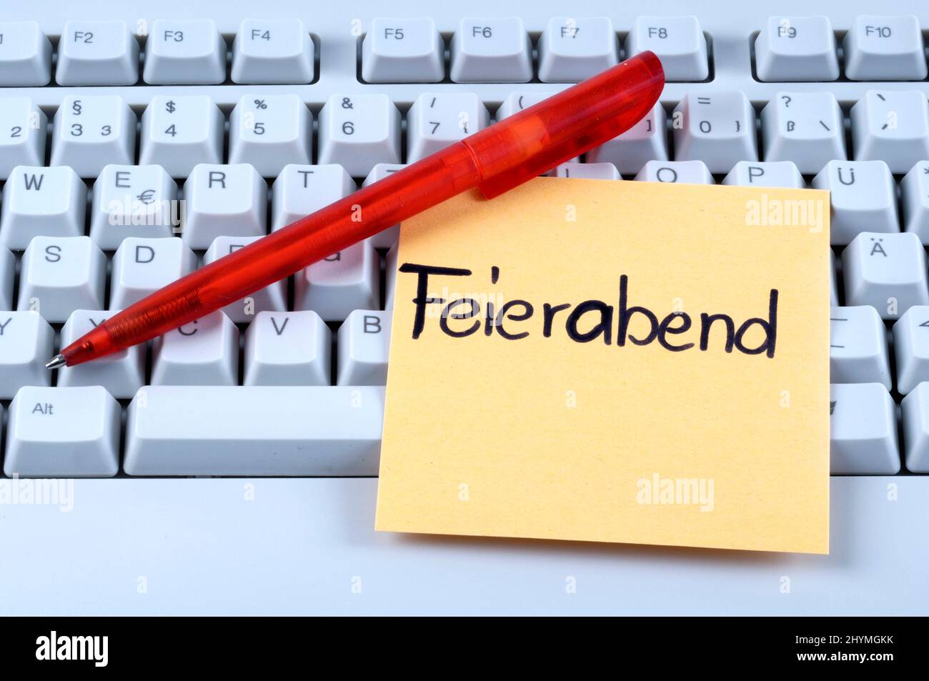 Keyboard with a message Feierabend, finishing time, Germany Stock Photo