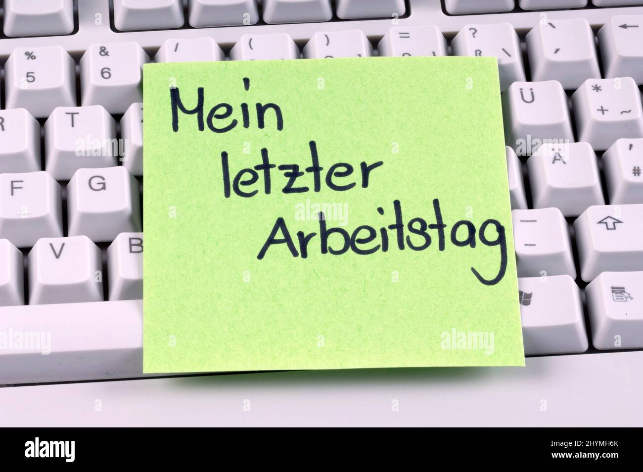 Keyboard with a message 'Mein letzter Arbeitstag', last working day Stock Photo