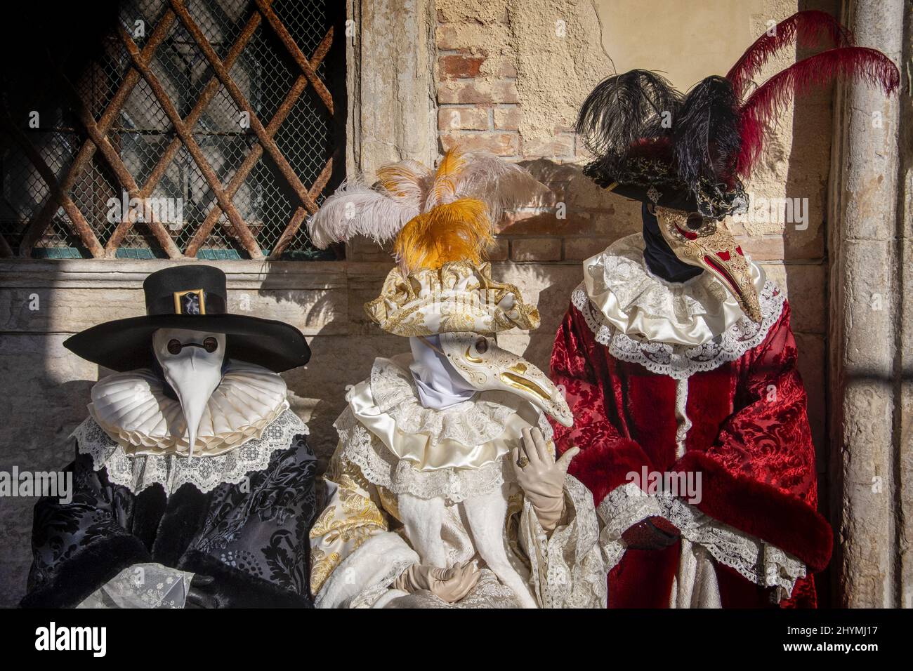 Participants wearing creative costumes and masks in Carnival of Venice