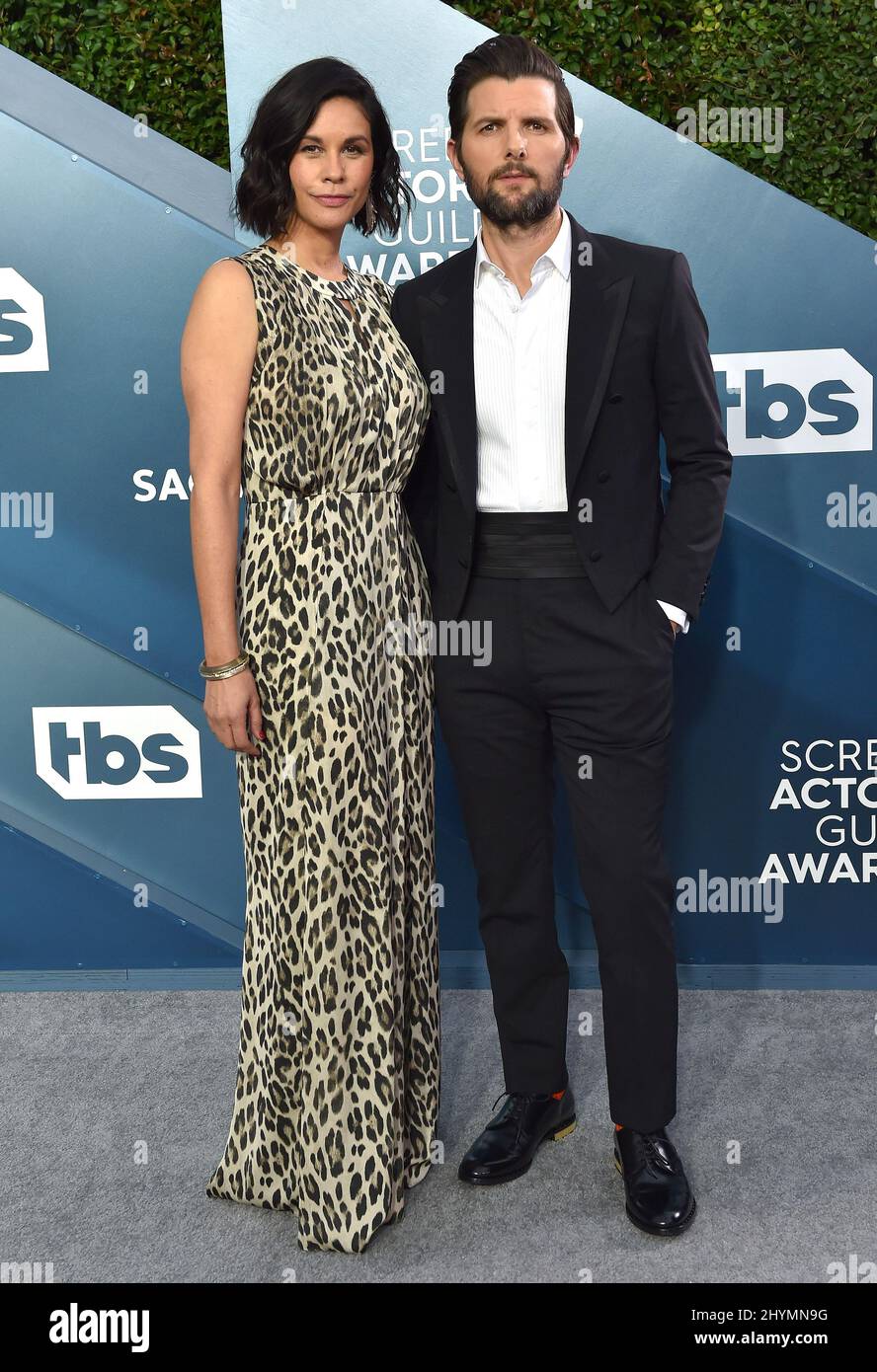 Naomi Scott and Adam Scott at the 26th Annual Screen Actors Guild Awards held at the Shrine Auditorium on January 19, 2020 in Shrine Auditorium, CA. Stock Photo