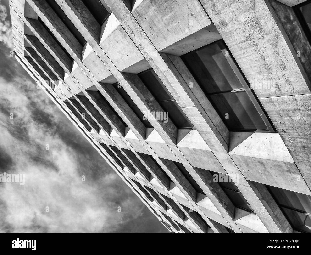 Low angle shot of a modern building in black and white Stock Photo - Alamy