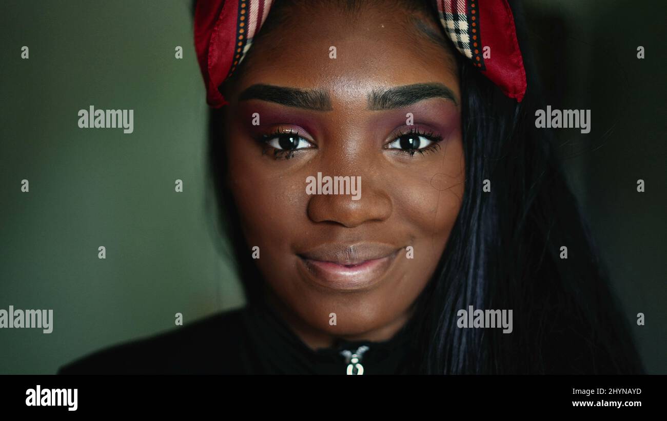 A black girl portrait face smiling looking at camera Stock Photo - Alamy
