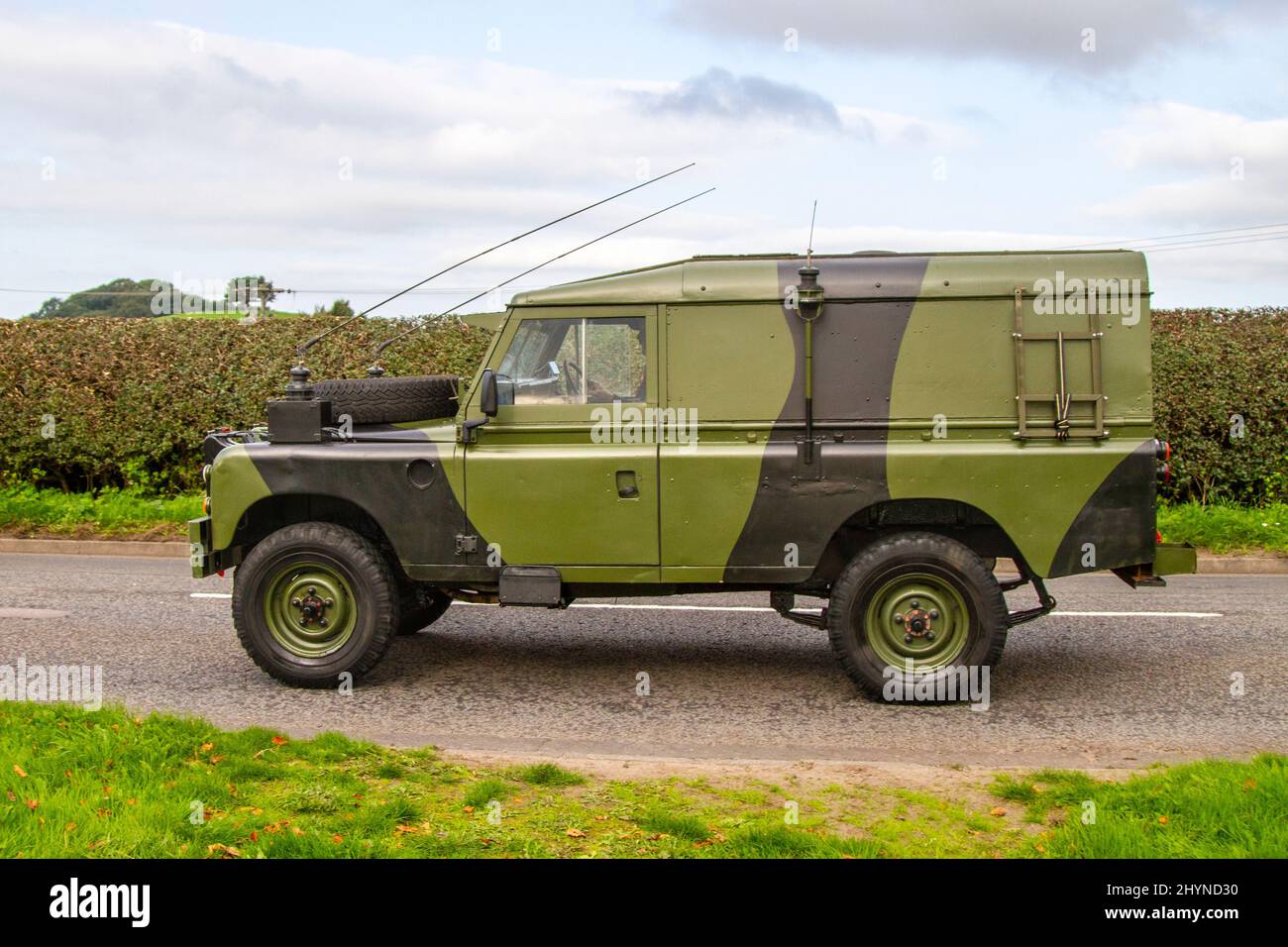 1972 70s seventies British LWB green Land Rover; en-route to Capesthorne Hall classic August car show, Cheshire, UK Stock Photo