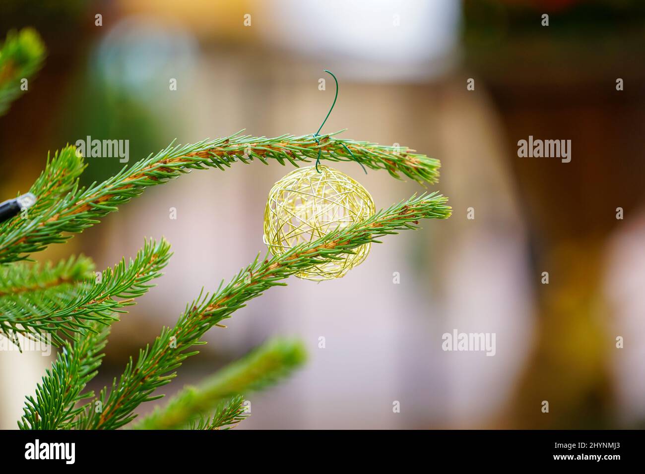 Closeup Of A Christmas Ornament On A Tree On A Blurred Background Stock 