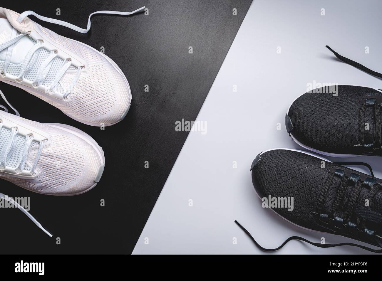Flat lay sport with sport shoes on white and blackbackground. Concept ...