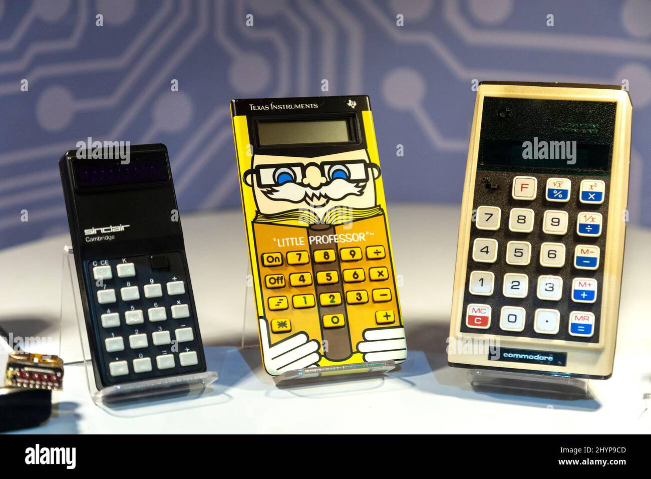 Vintage 1970s and 1980s calculators from Sinclair, Texas Instruments and Commodore on display, Centre for Computing History, Cambridge, UK Stock Photo