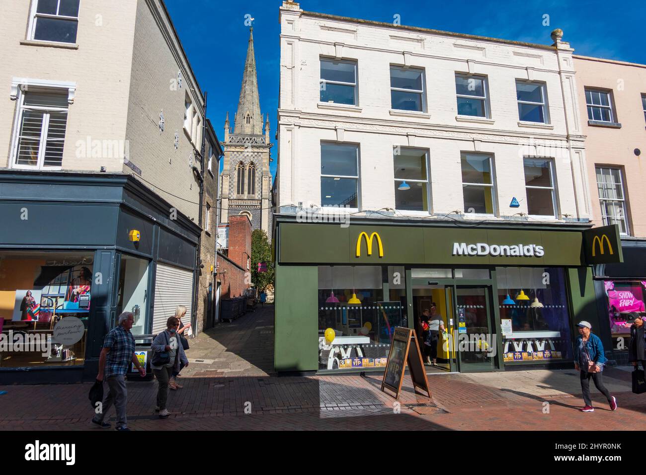 A warm autumn day during Covid in Ipswich Town Centre busy with visitors, McDonalds on Tavern street Suffolk, UK Stock Photo
