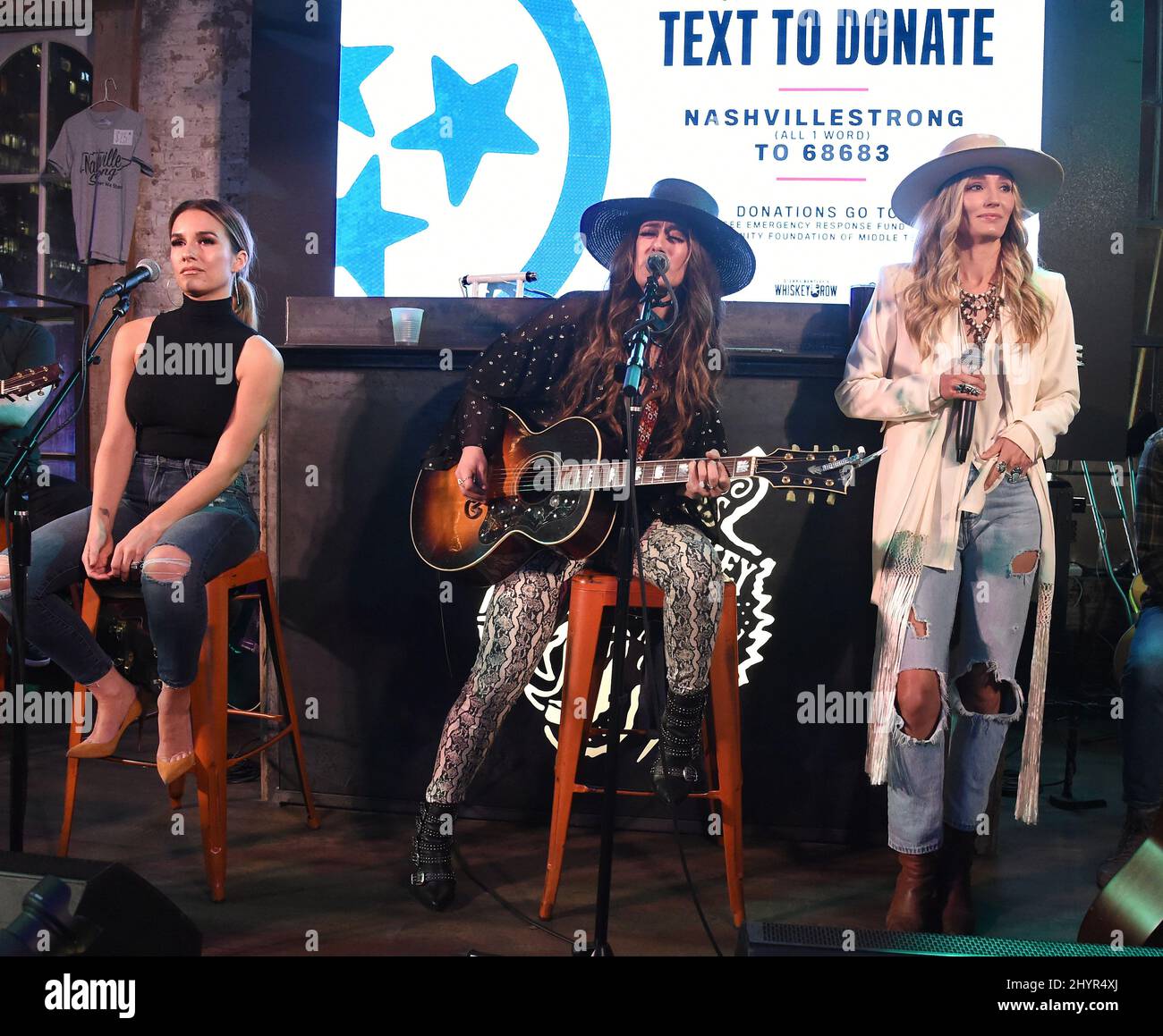 Jessie James Decker and The Sisterhood on stage at the Whiskey Row Tornado Relief Concert Hosted by Mitchell Tenpenny & Friends at Dierks Bentley's Whiskey Row in Nashville, TN. on March 9, 2020 Stock Photo