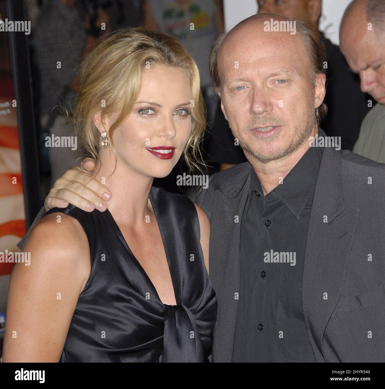 Charlize Theron and Paul Haggis at the Los Angeles premiere of movie 'In the Valley of Elah' in Los Angeles, CA. Stock Photo