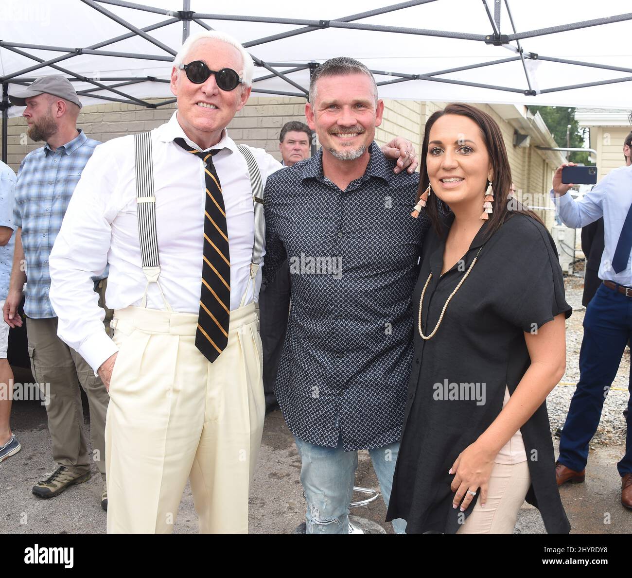 Roger Stone, Pastor Greg Locke and wife Tai Locke at the Global Vision