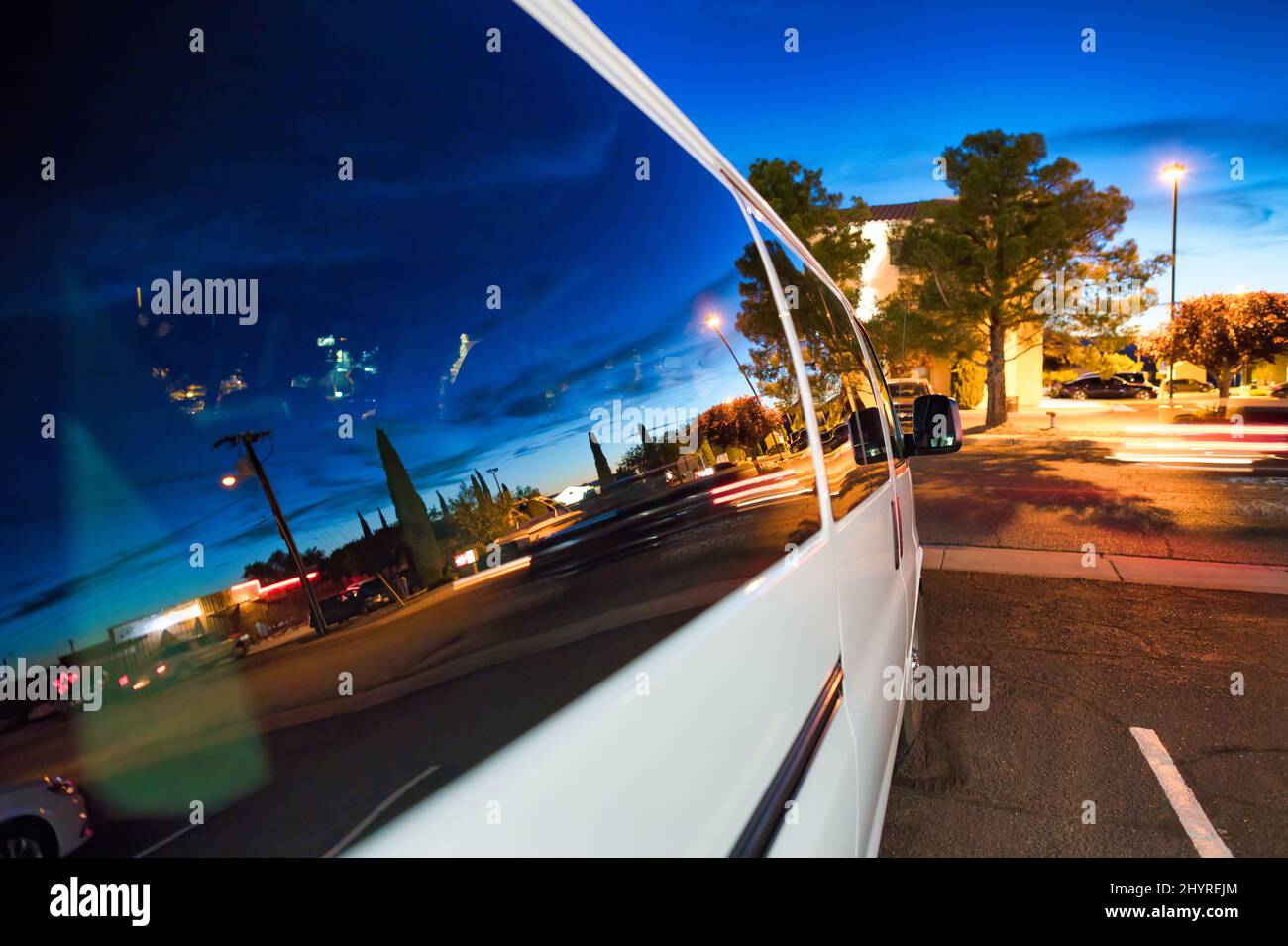 Sunset city reflections on a car side window Stock Photo Alamy