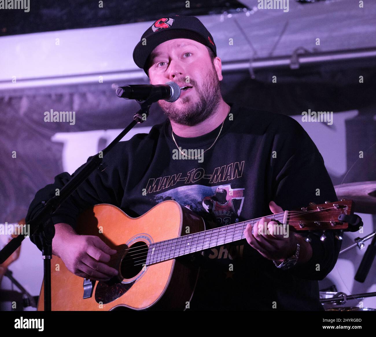 Mitchell Tenpenny onstage at Christmas 4 Kids 'When Pigs Fly' dinner event in Hendersonville Stock Photo
