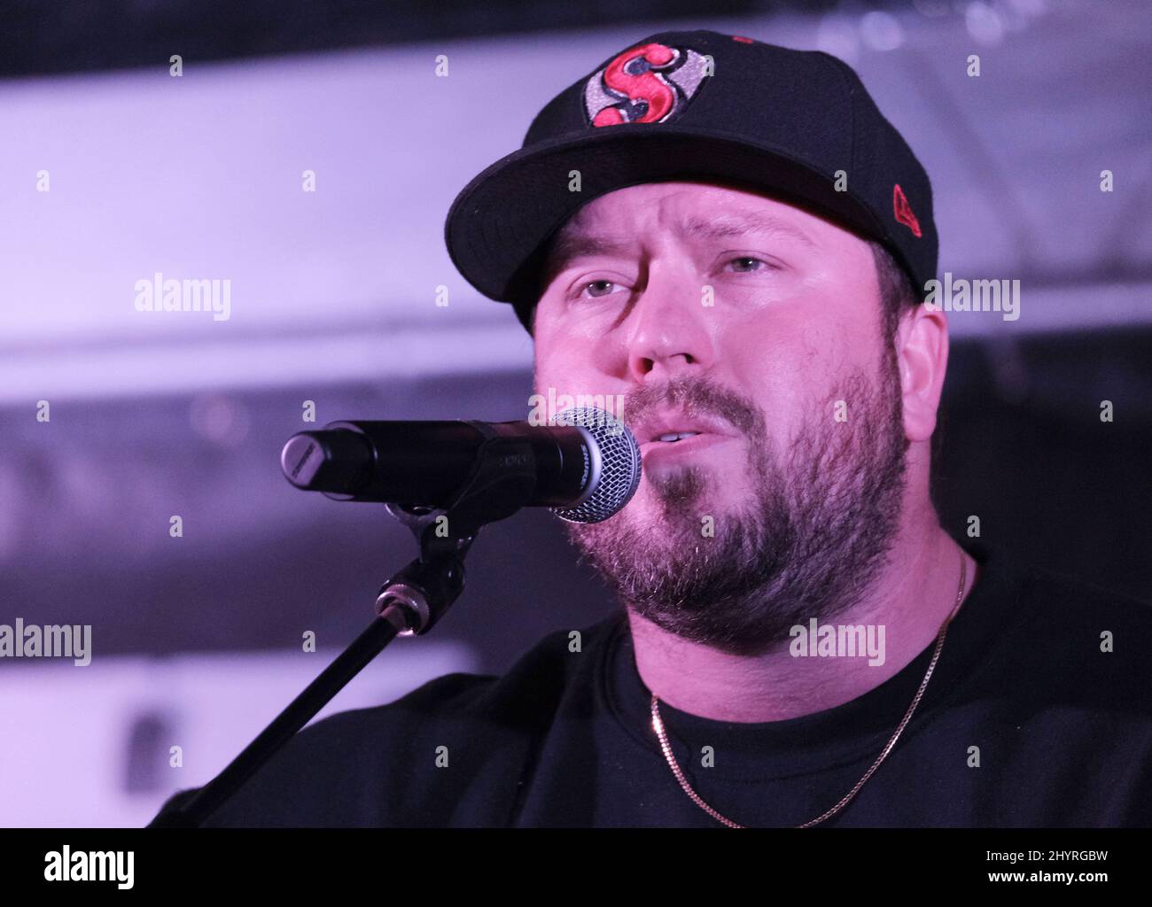 Mitchell Tenpenny onstage at Christmas 4 Kids 'When Pigs Fly' dinner event in Hendersonville Stock Photo