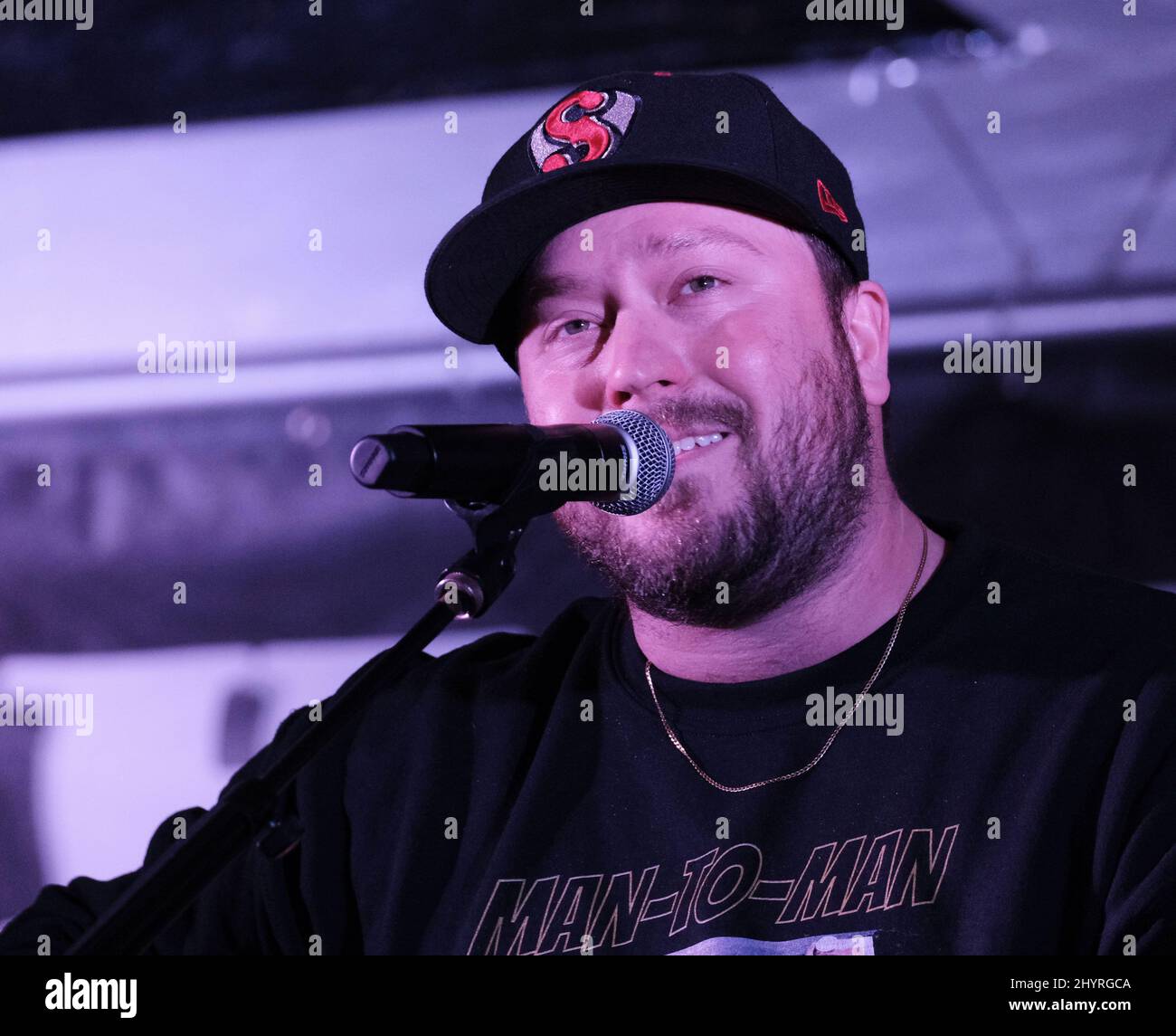 Mitchell Tenpenny onstage at Christmas 4 Kids 'When Pigs Fly' dinner event in Hendersonville Stock Photo