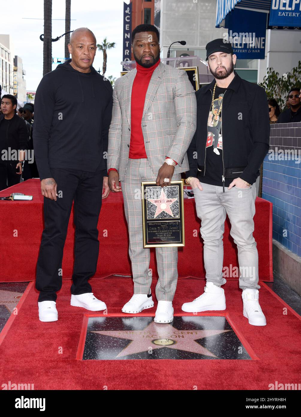 Dr Dre is in ICU after suffering a brain aneurysm on Monday in Los Angeles, Ca. Curtis '50 Cent' Jackson, Dr Dre and Eminem is joined by Dr Dre and Eminem at his Hollywood Walk of Fame star ceremony on January 30, 2020 in Hollywood, CA. Stock Photo