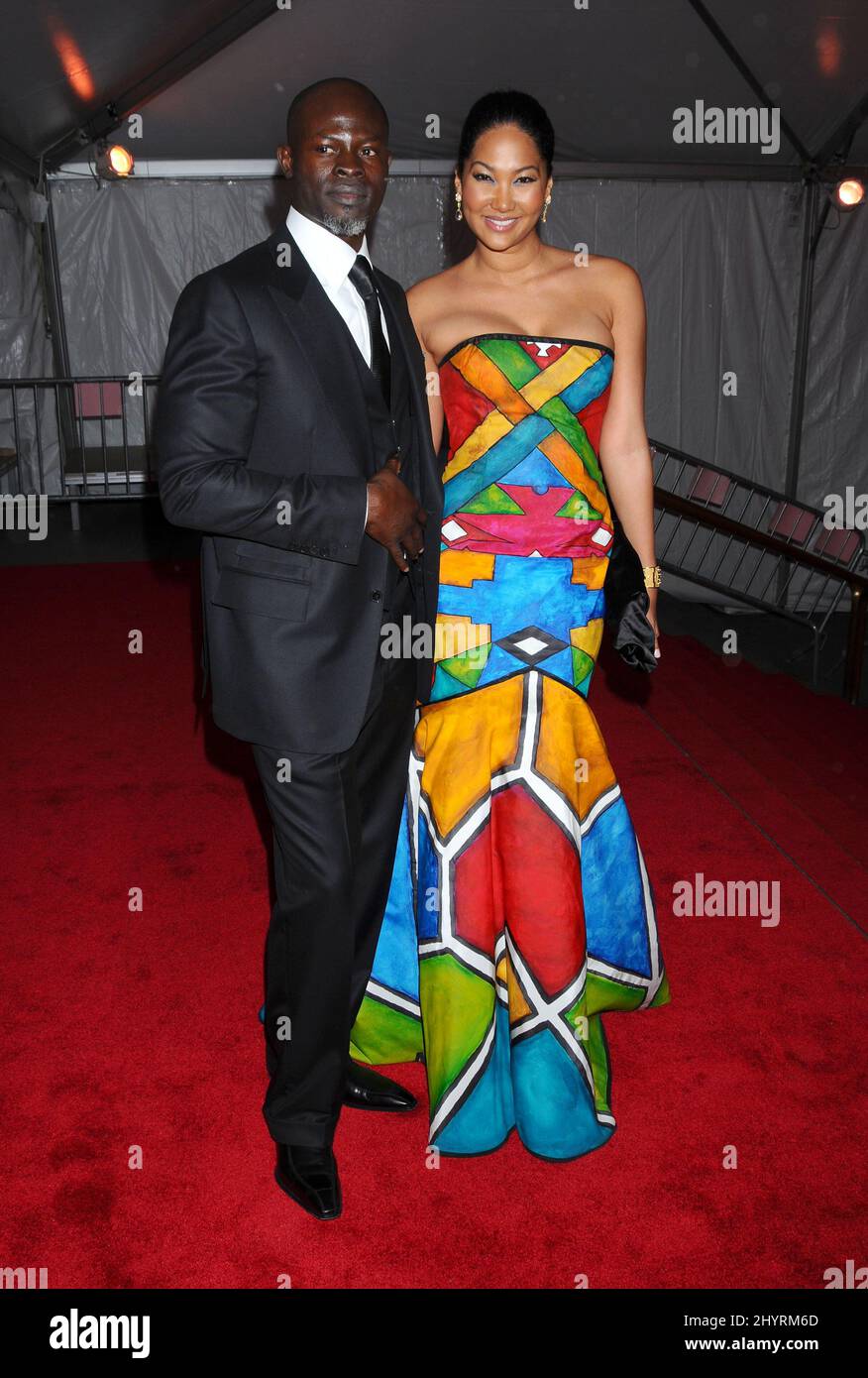 Djimon Hounsou and Kimora Lee Simmons arriving at the Costume Institute