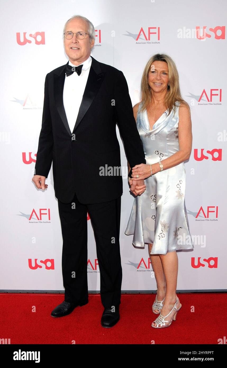 Chevy Chase and wife Jayni Chase at the 36th AFI Life Achievement Award Tribute to Warren Beatty held at the Kodak Theatre in Hollywood. Stock Photo