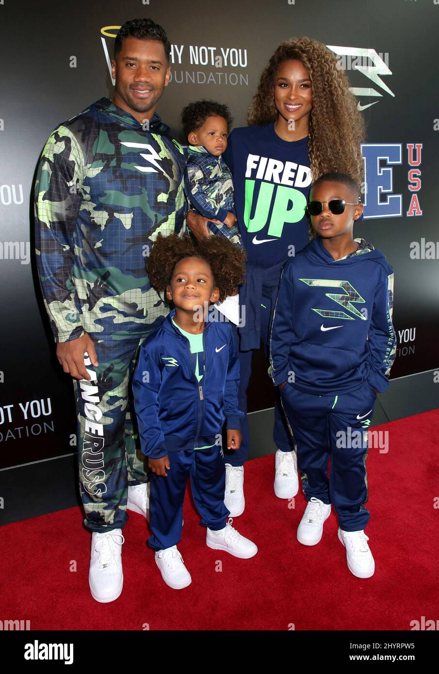 Russell Wilson, Ciara & children attending Russell Wilson & Ciara(02)