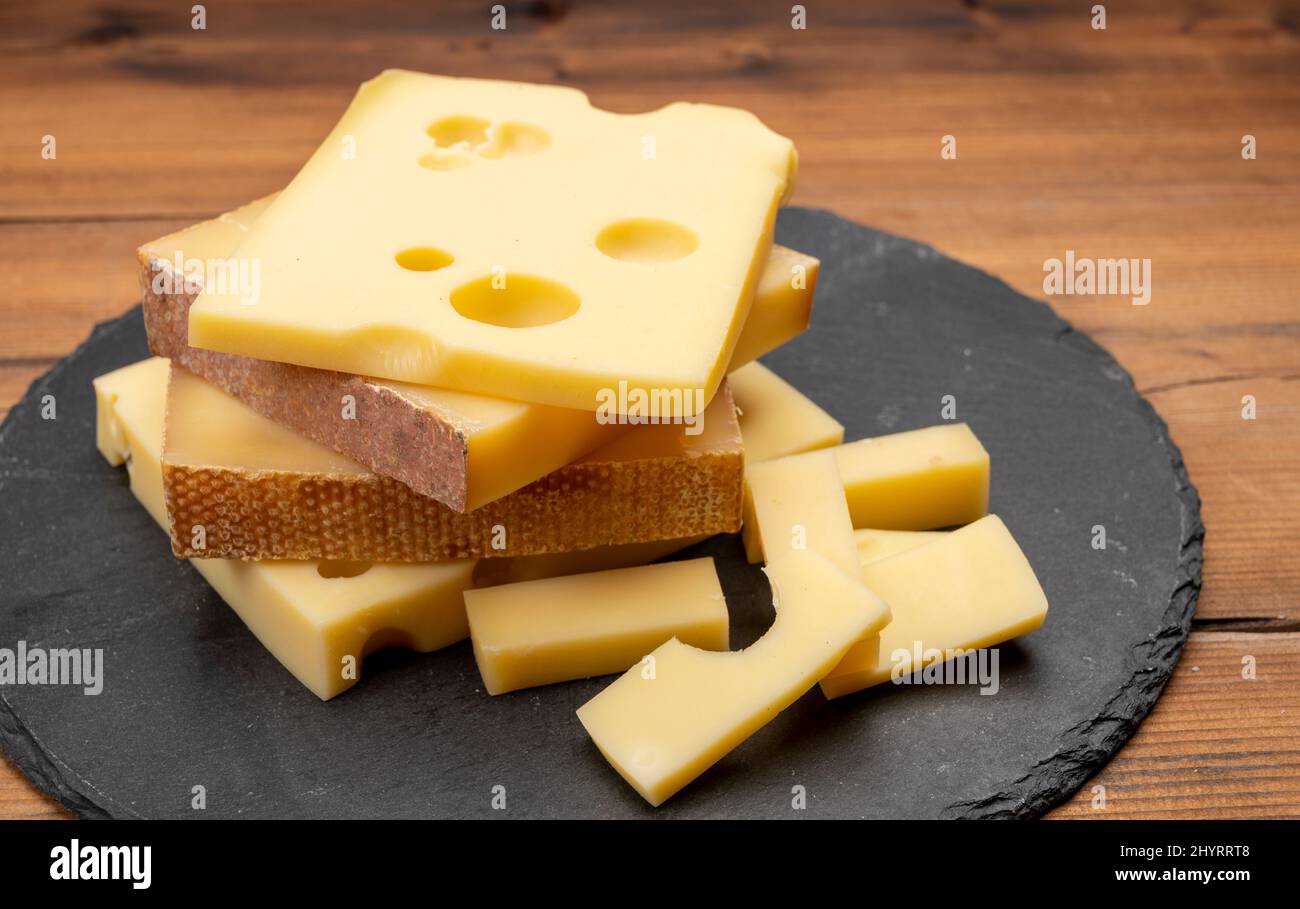 Swiss cheese collection, emmentaler with holes, gruyere, appenzeller ...