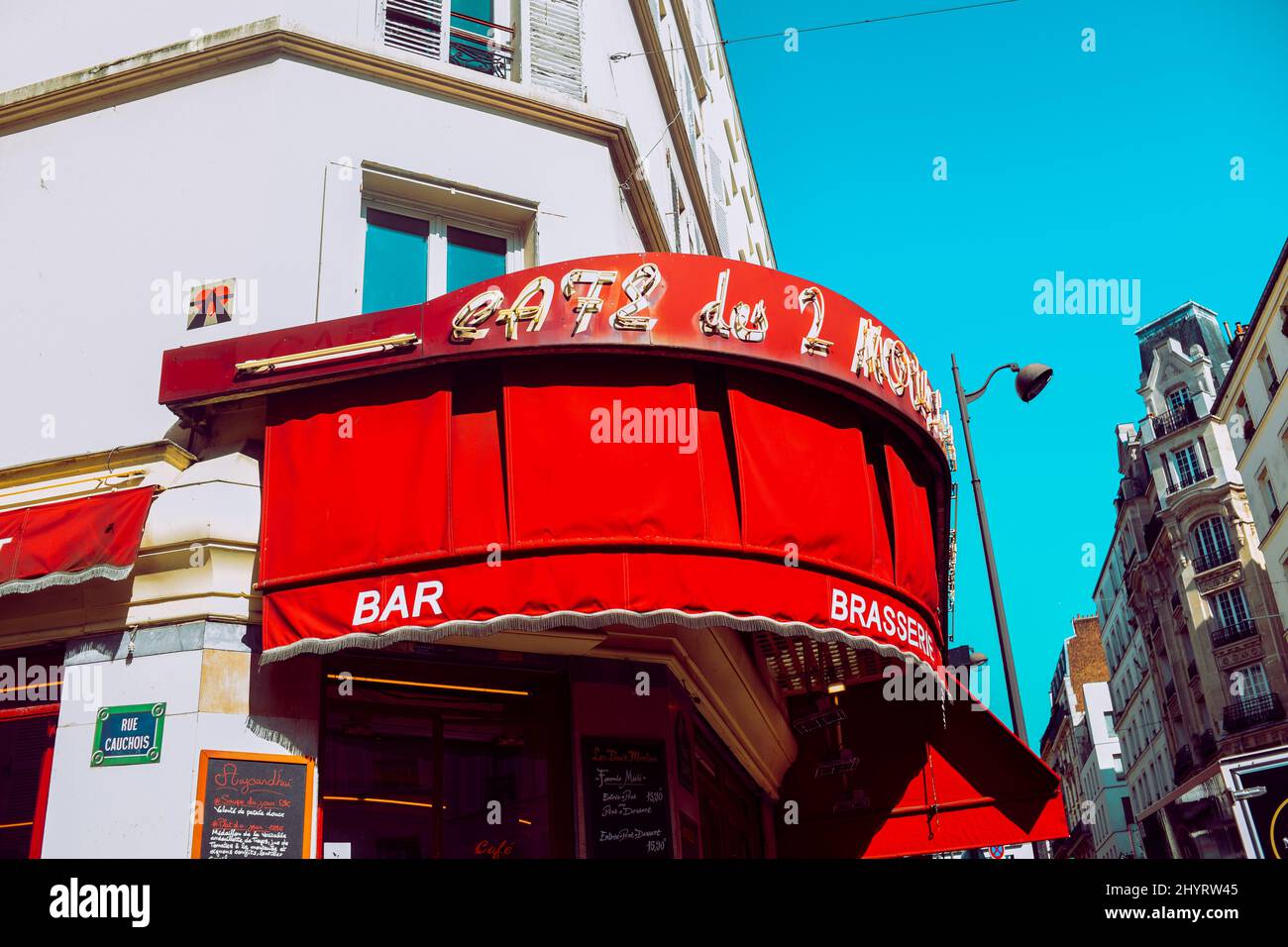 PARIS, FRANCE, 08.03.2022. famous cafe two mills on rue Lepic, Montmartre. Cafe two mills (Cafe des Deux Moulins) from the film about Amelie, one of t Stock Photo