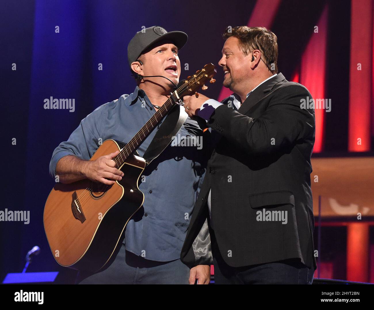 Garth Brooks and Storme Warren performing onstage at Loretta Lynn's Friends: Hometown Rising benefit concert with proceeds benefiting the United Way of Humphreys County on September 13, 2021 in Nashville, TN. Stock Photo