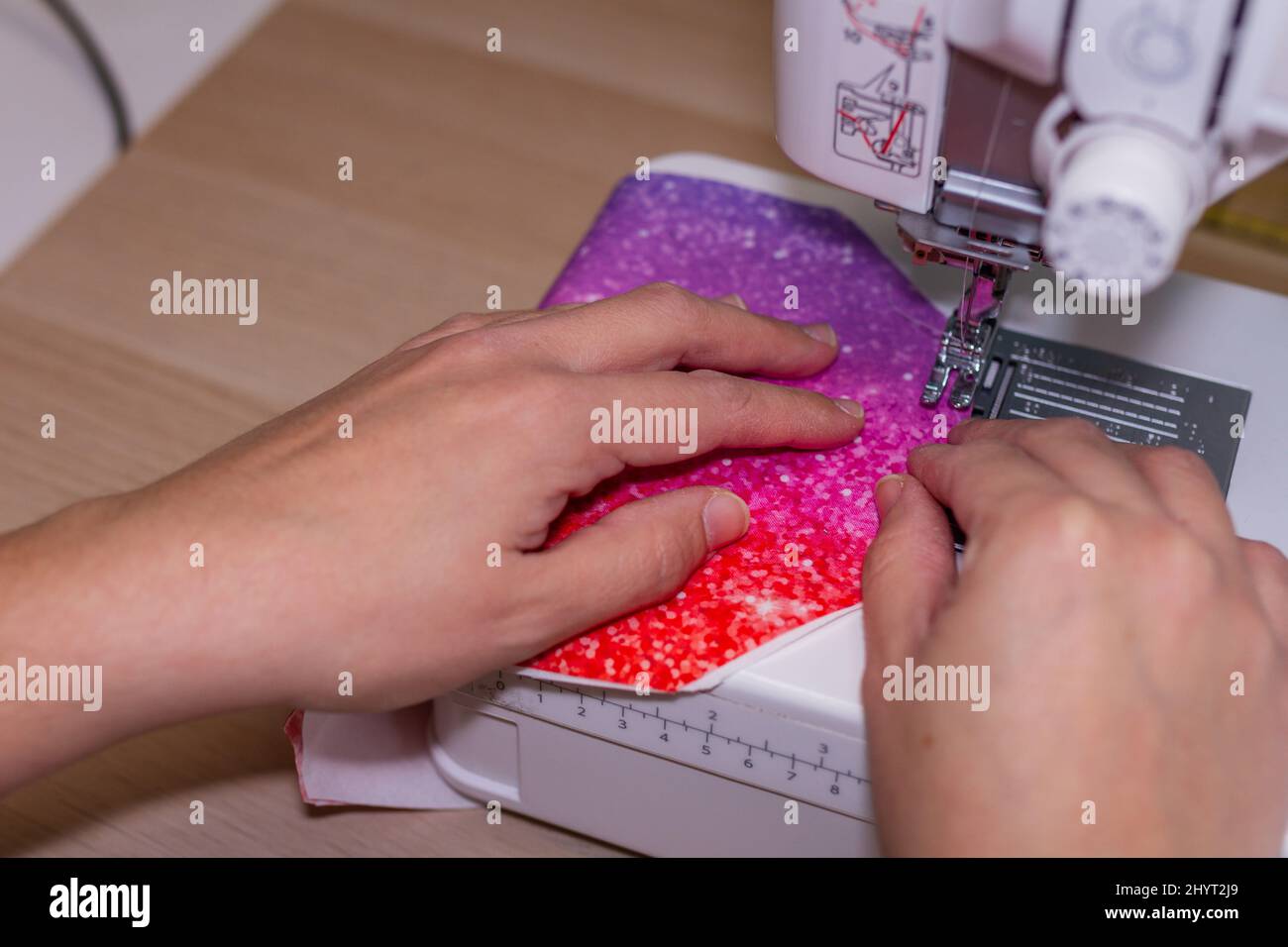 Unrecognizable seamstress working with sewing machine Stock Photo Alamy