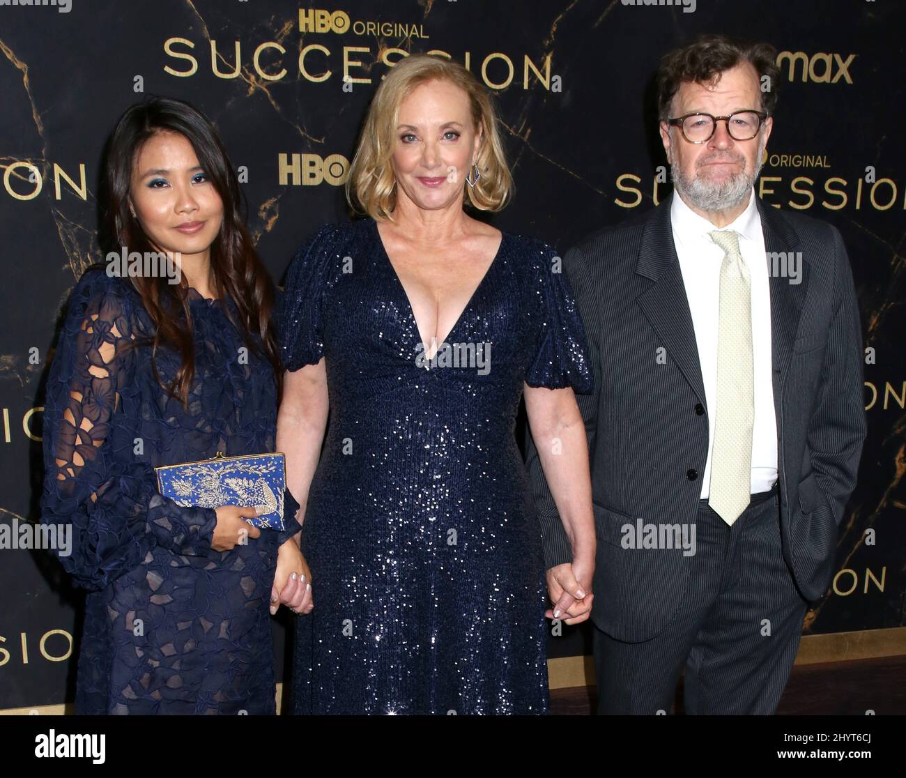 J. Smith-Cameron, husband Kenneth Lonergan and daughter Nellie Lonergan attending the 'Succession' Season 3 Premiere held at the Museum of Natural History on October 12, 2021 in New York City, NY Stock Photo