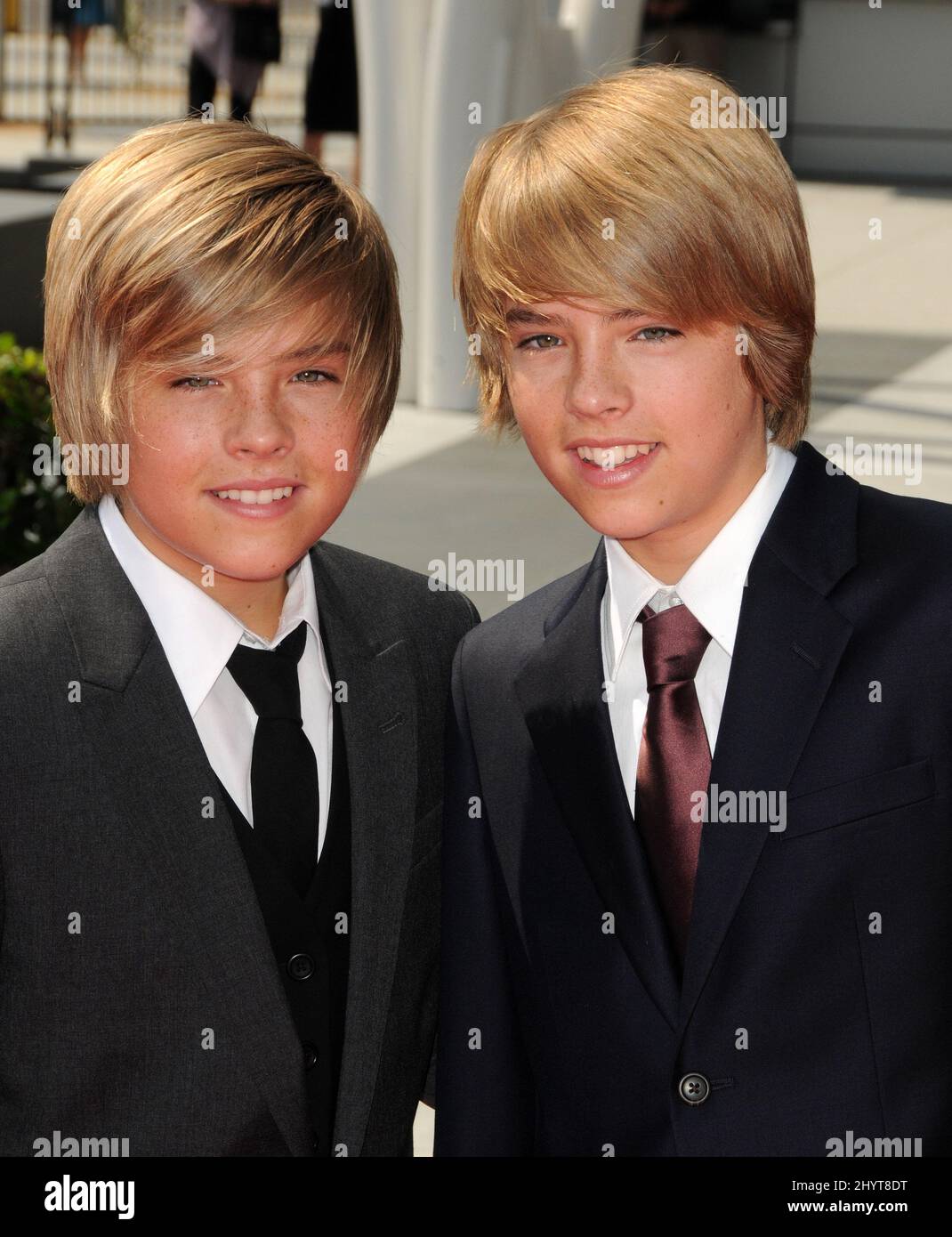 Dylan Sprouse and Cole Sprouse arriving at the 60th Primetime Creative Arts Emmy Awards held at the Nokia Theatre, Los Angeles. Stock Photo