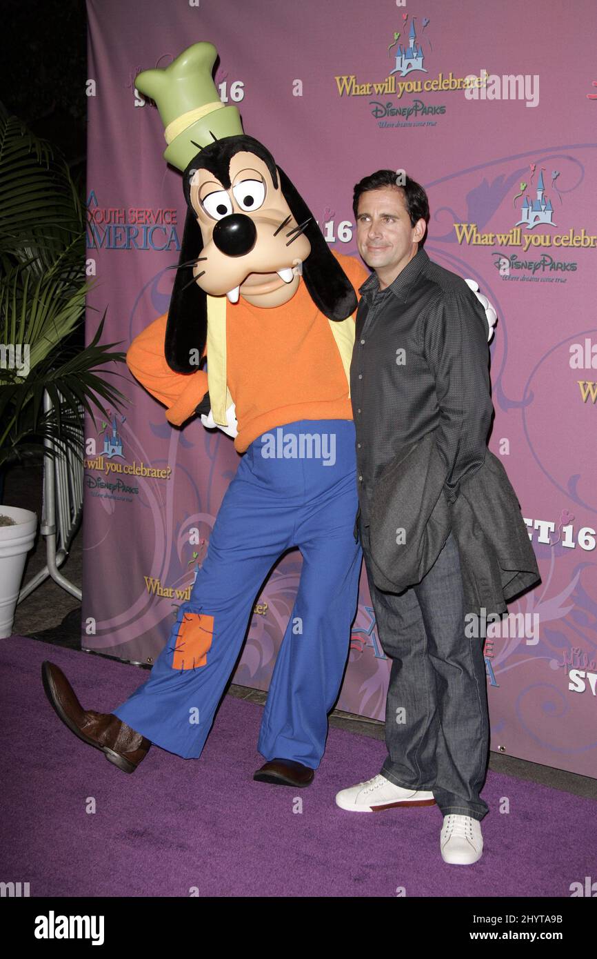 Steve Carell and Goofy attend Miley Cyrus' Sweet 16 Birthday Bash, held at Disneyland. Stock Photo